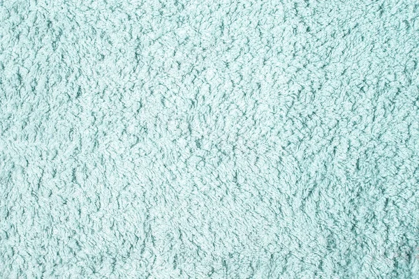 Фон с текстурой из голубой махровой ткани . — стоковое фото