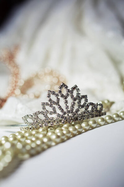 Tiara and pearls with wedding dress