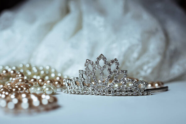 Tiara and pearls with wedding dress