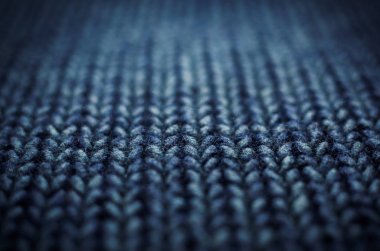 Kış kazak tasarım. örgü yün doku arka plan mavi