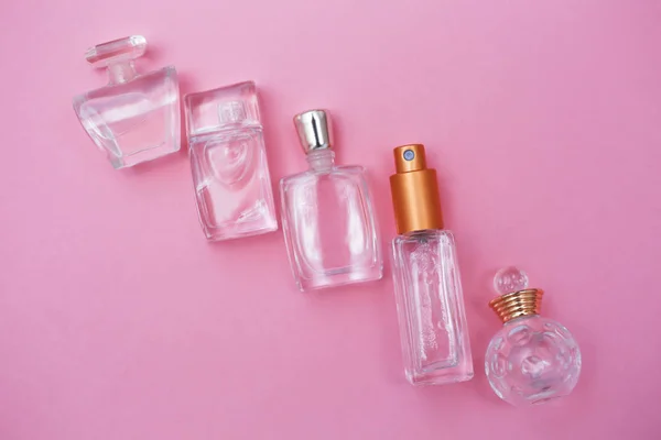 Perfume Bottles on light Pink background. Perfumery — Stock Photo, Image