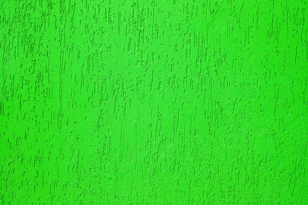 Parede é coberta com massa de vidraceiro verde decorativo — Fotografia de Stock