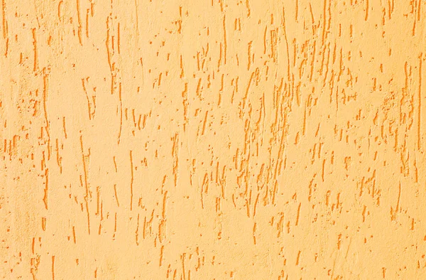 Textur einer gelben Spachtelwand — Stockfoto