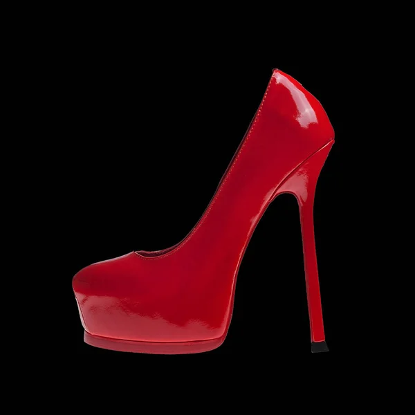Kvinna röda skor på svart bakgrund — Stockfoto