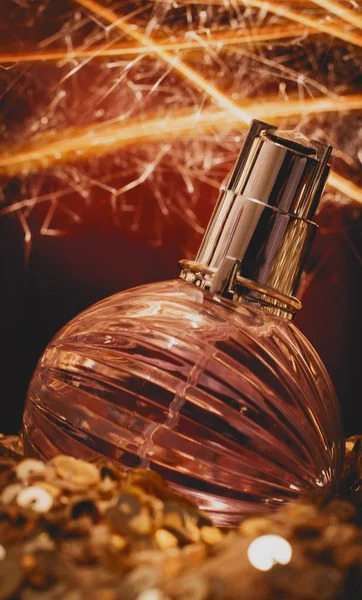Złote perfumy bokeh — Zdjęcie stockowe