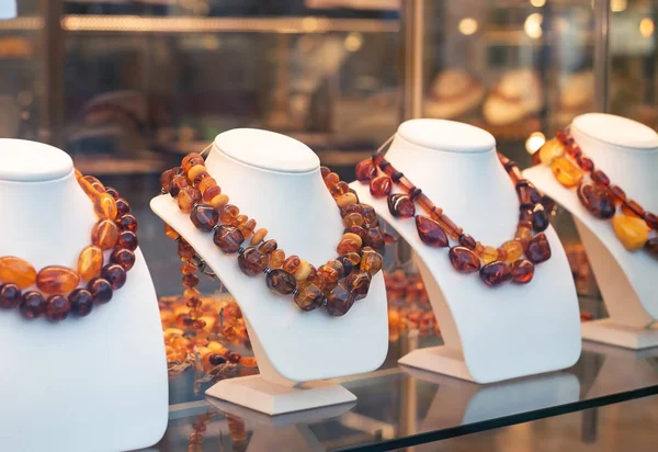 Amber jewelry in a shop window — Stock Photo, Image