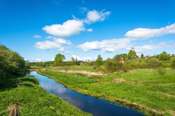 Panorama of the village of Mikhailovskoye in a Sunny spring day. Obrazy Stockowe bez tantiem