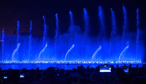 Singing fountains. Glowing colored fountains and laser show — Stock Photo, Image