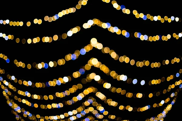 Natal levou luzes guirlanda isolado em preto — Fotografia de Stock