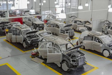 Repair and painting center of vehicles, work area for cars, mechanical center for transport