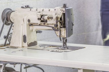 Industrial sewing machine, preparing new look