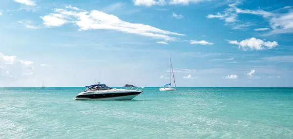 Attractive bright view of exotic colorful beautiful marine beach with boat on blue water — Stock Photo, Image