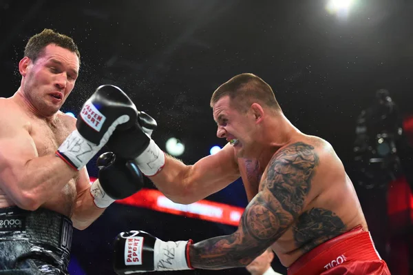 An unidentified boxers in the ring during fight for ranking points — Stock Photo, Image