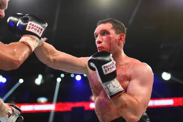 An unidentified boxers in the ring during fight for ranking points — Stock Photo, Image