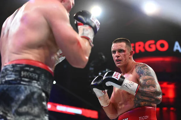 An unidentified boxers in the ring during fight for ranking points — Stock Photo, Image