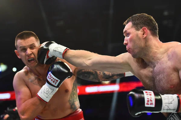 An unidentified boxers in the ring during fight for ranking points — Stock Photo, Image