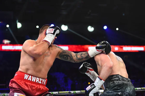 An unidentified boxers in the ring during fight for ranking points — Stock Photo, Image