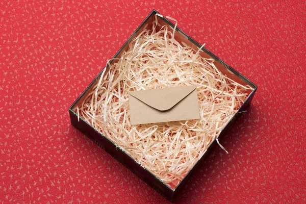 Envelope in present box