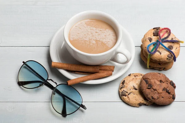 Cup of coffee with cookies