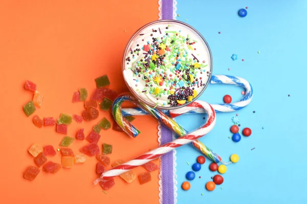 Milk shake with colorful candies — Stock Photo, Image