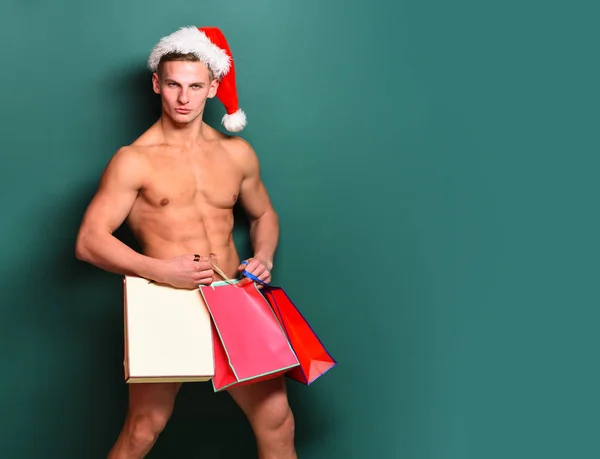 Pohledný macho santa muž — Stock fotografie