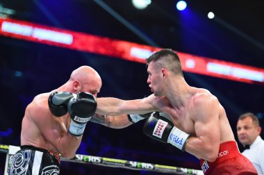 Kimliği belirsiz bir boksörler sıralaması için kavga sırasında halka