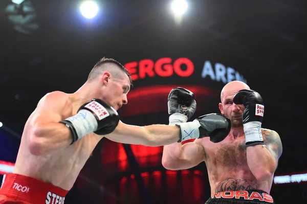 An unidentified boxers in the ring during fight for ranking points — Stock Photo, Image