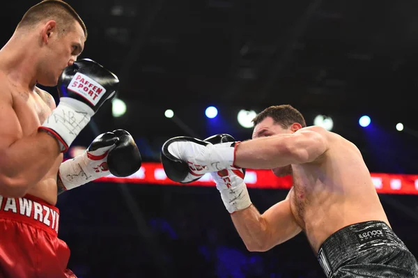 An unidentified boxers in the ring during fight for ranking points — Stock Photo, Image