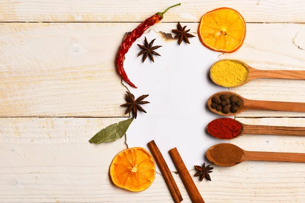 Spicy fragrant spices in spoons — Stock Photo, Image