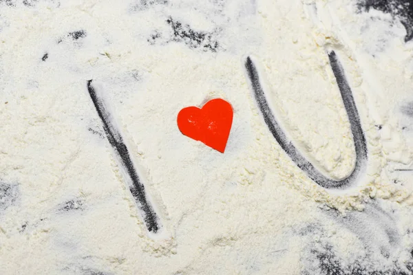 Inscription painted on flour — Stock Photo, Image