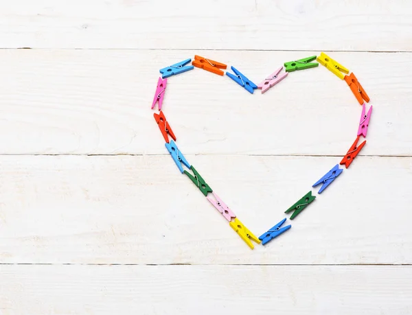 Valentine heart made from clothespins — Stock Photo, Image