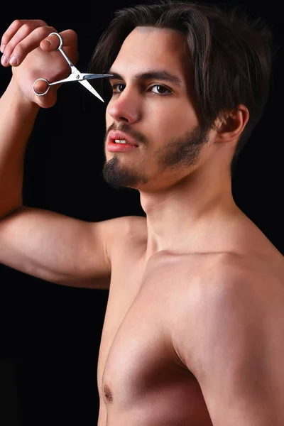 Bearded macho with scissors — Stock Photo, Image