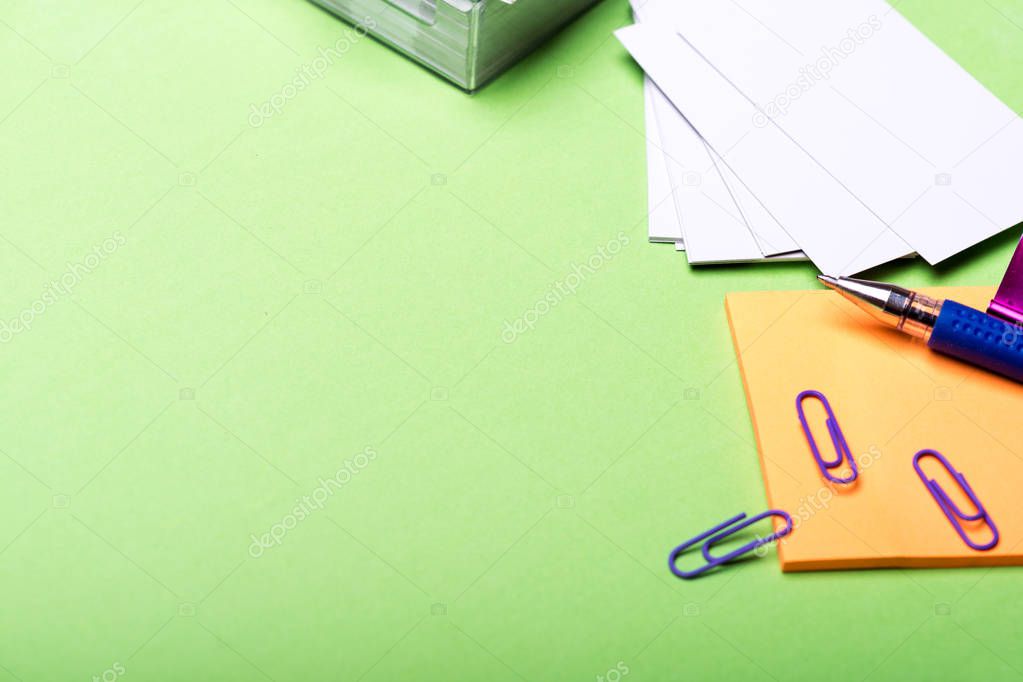 stationery for office: box with blanks, paper clips, pen, stickers