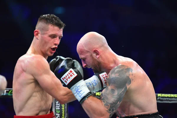 An unidentified boxers in the ring during fight for ranking points — Stock Photo, Image