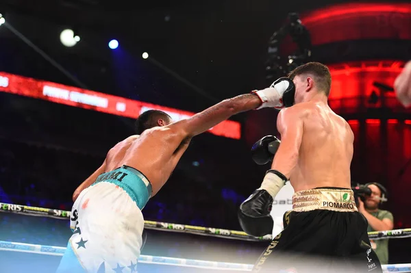 An unidentified boxers in the ring during fight for ranking points — Stock Photo, Image