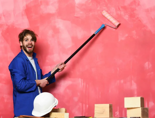 Smiling Man Holding Paint — стоковое фото