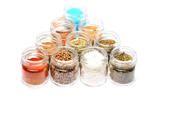 Various spices in jars on white background — Stock Photo, Image