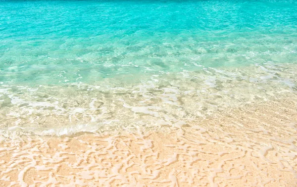 Wavy water background on sand — Stock Photo, Image