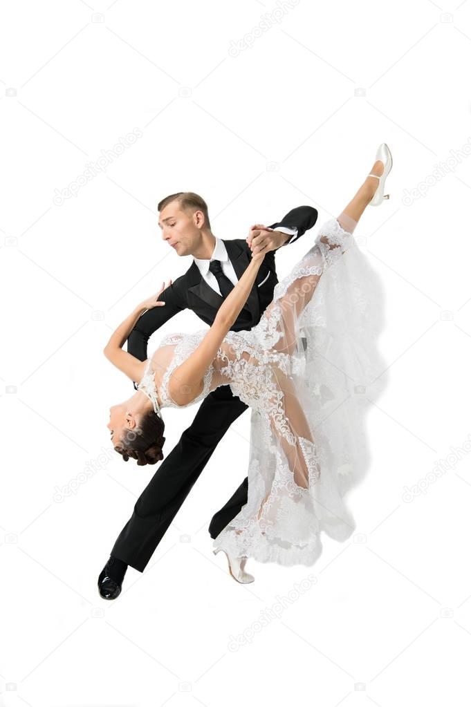 ballrom dance couple in a dance pose isolated on white bachgroun