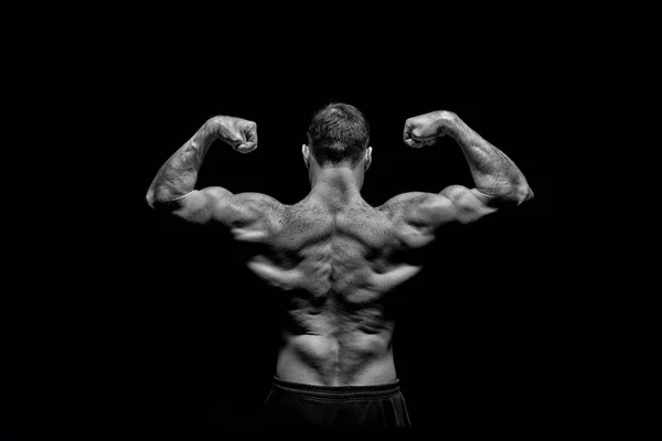Handsome bodybuilder man with muscular body training and posing — Stock Photo, Image