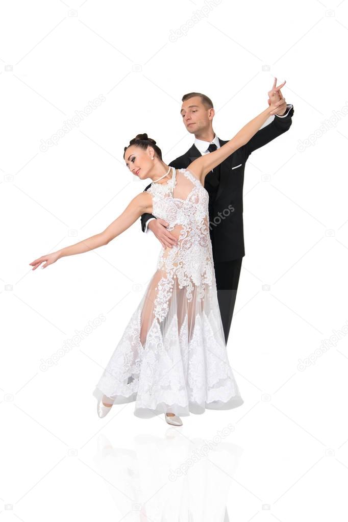 ballrom dance couple in a dance pose isolated on white bachground