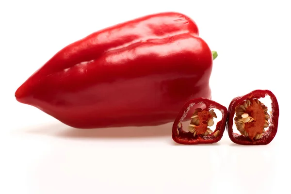 Fresh red vegetables, capsicum, cut chilli pepper isolated on white — Stock Photo, Image