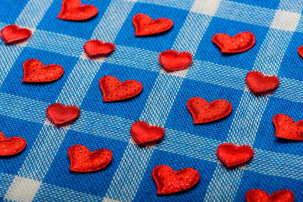 Valentines love symbol on blue plaid fabric, checkered cloth background — Stock Photo, Image