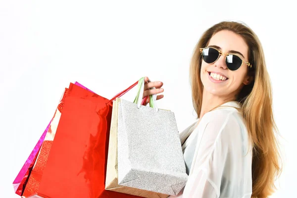 Fashionable sexy woman or girl holding package or bags — Stock Photo, Image