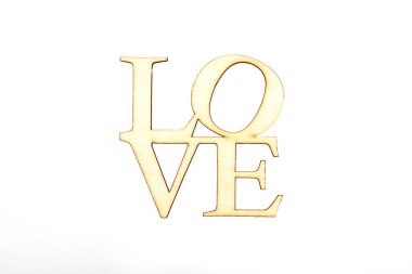 Ahşap kelime aşk üzerine beyaz izole