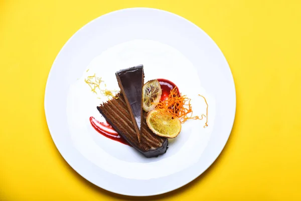 chocolate brownie cake with jam, lemon citrus dried peel