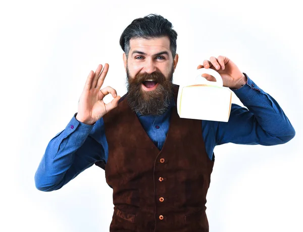Szakállas férfi kezében ebéd doboz boldog arccal — Stock Fotó