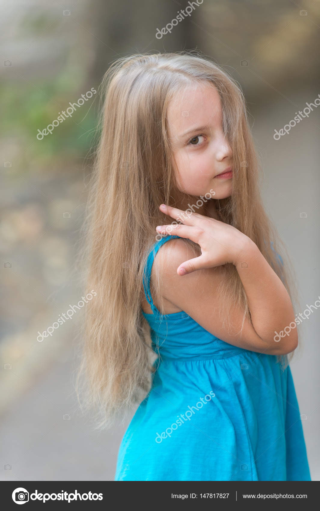 baby with blue dress