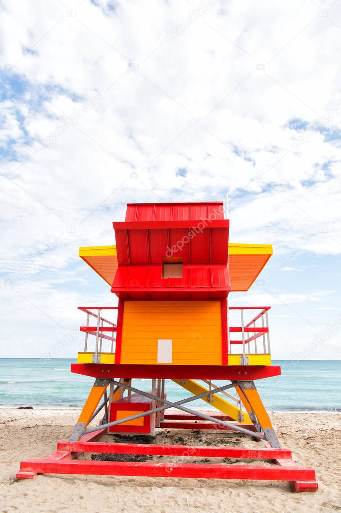 lifeguard house red, orange color on sandy beach, Miami, Florida
