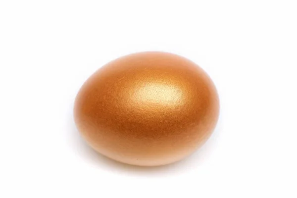 Traditional egg painted in golden color — Stock Photo, Image